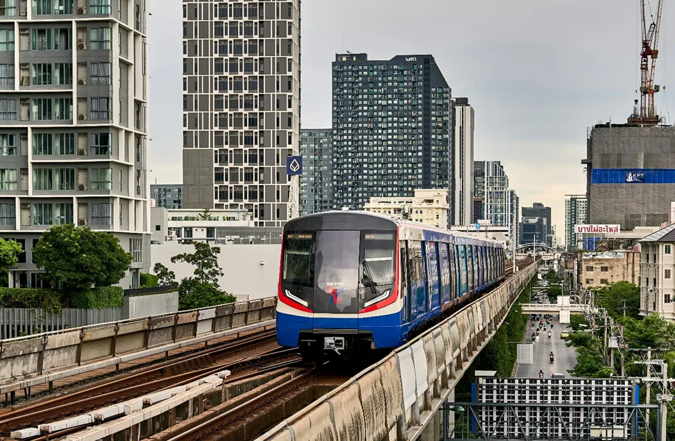 The BTS Skytrain cruising along the railway in Bangkok